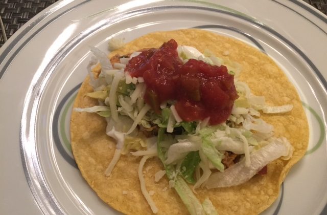Easy and Tasty, you can beat the heat with these summer slow cooker chicken tacos (photo by LivligaHome).