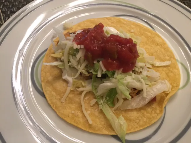 Easy and Tasty, you can beat the heat with these summer slow cooker chicken tacos (photo by LivligaHome).