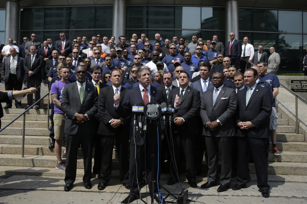 Patrolmen's Benevolent Association President Patrick Lynch speaks to reporters after Demetrius Blackwell's arraignment in Queens criminal court in New York on June 11, 2015. (Mary Altaffer/AP Photo)