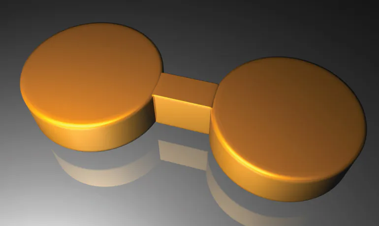 This artist's rendering depicts a pair of gold nanodisks linked by a gold bridge. (Fangfang Wen/Rice University)