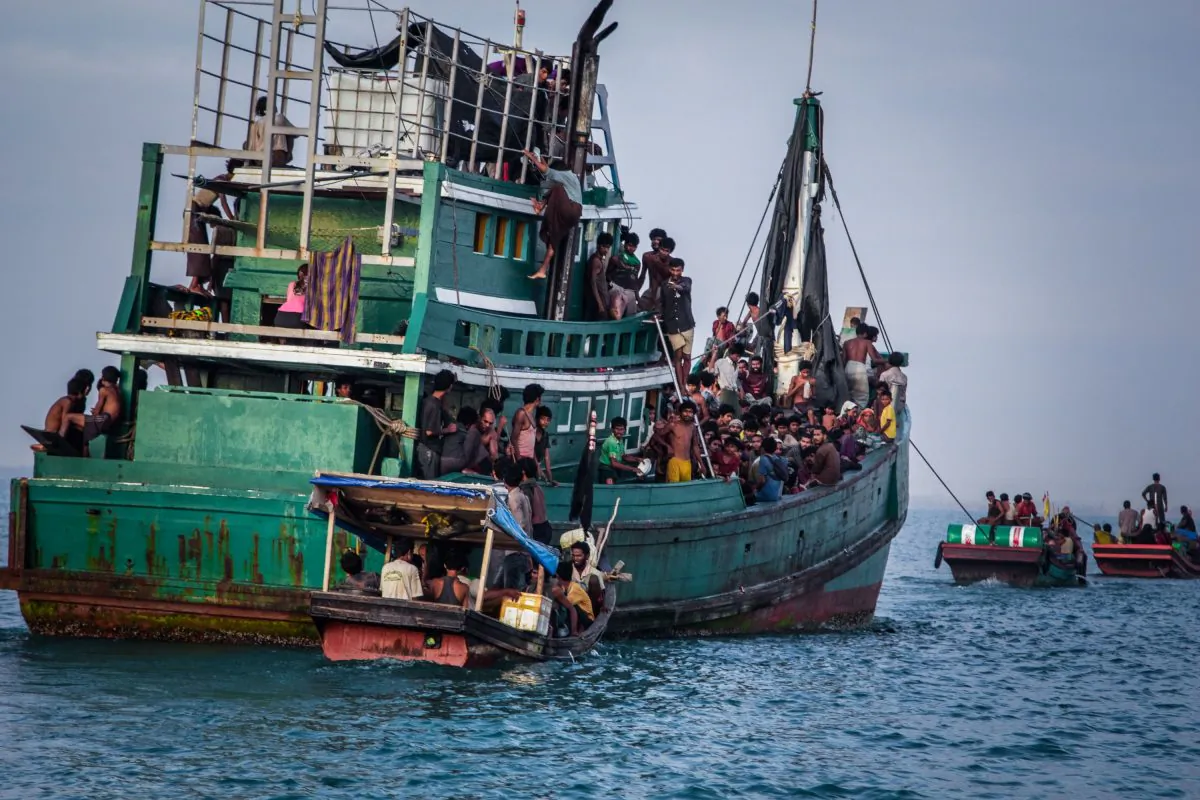 Rohingya migrants on a boat off Indonesia's coast await rescue on May 20. The Muslim Rohingya minority group is fleeing persecution in Burma. (JANUAR/AFP/Getty Images) 
