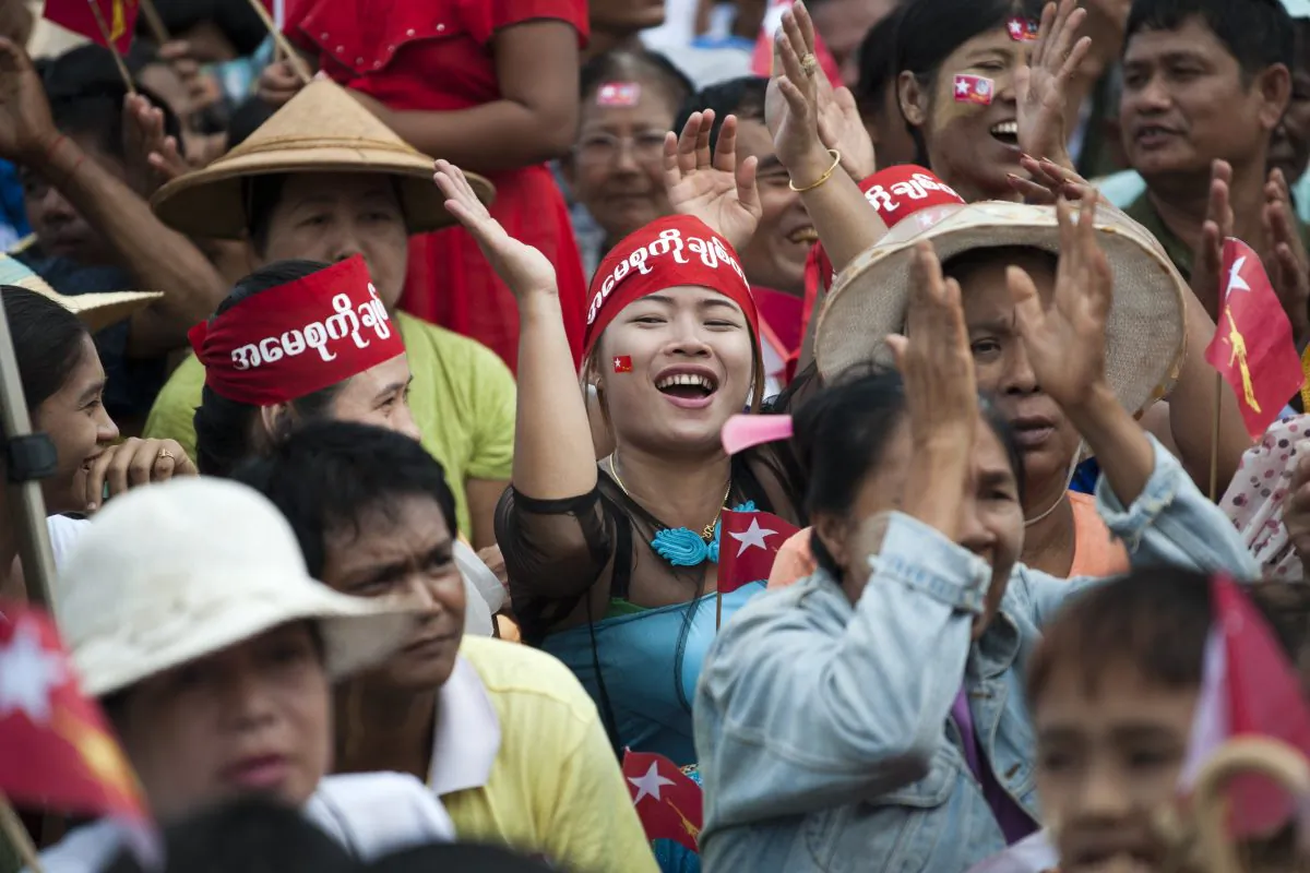 Supporters of Burma opposition leader Aung San Suu Kyi cheer as they attend a public gathering at Than Phyu Zayat township in Mawlamyaing, Mon State, Burma, on May 17, 2015. (Ye Aung Thu/AFP/Getty Images)