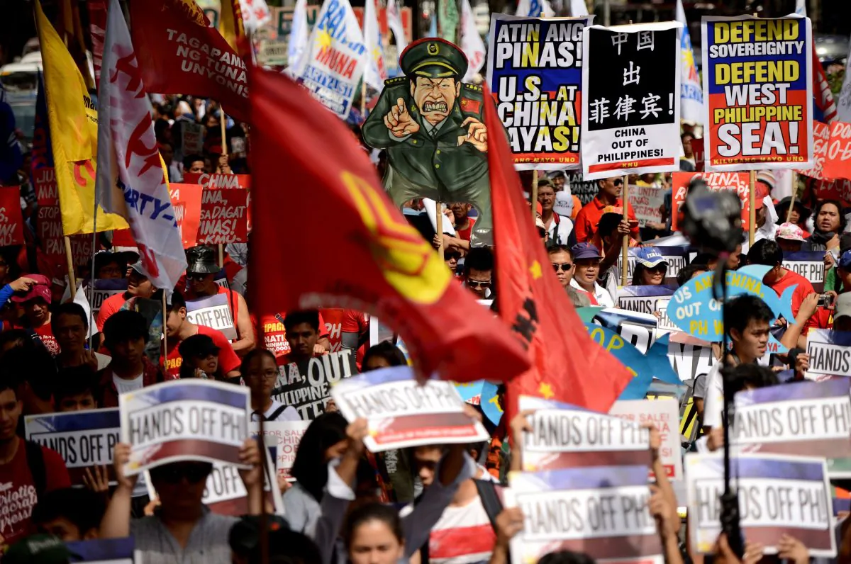 Activists hold a protest in front of the Chinese Consular Office in Manila on June 12, 2015, as the country commemorates the 117th anniversary of the Philippines' declaration of independence from Spain. (Noel Celis/AFP/Getty Images)