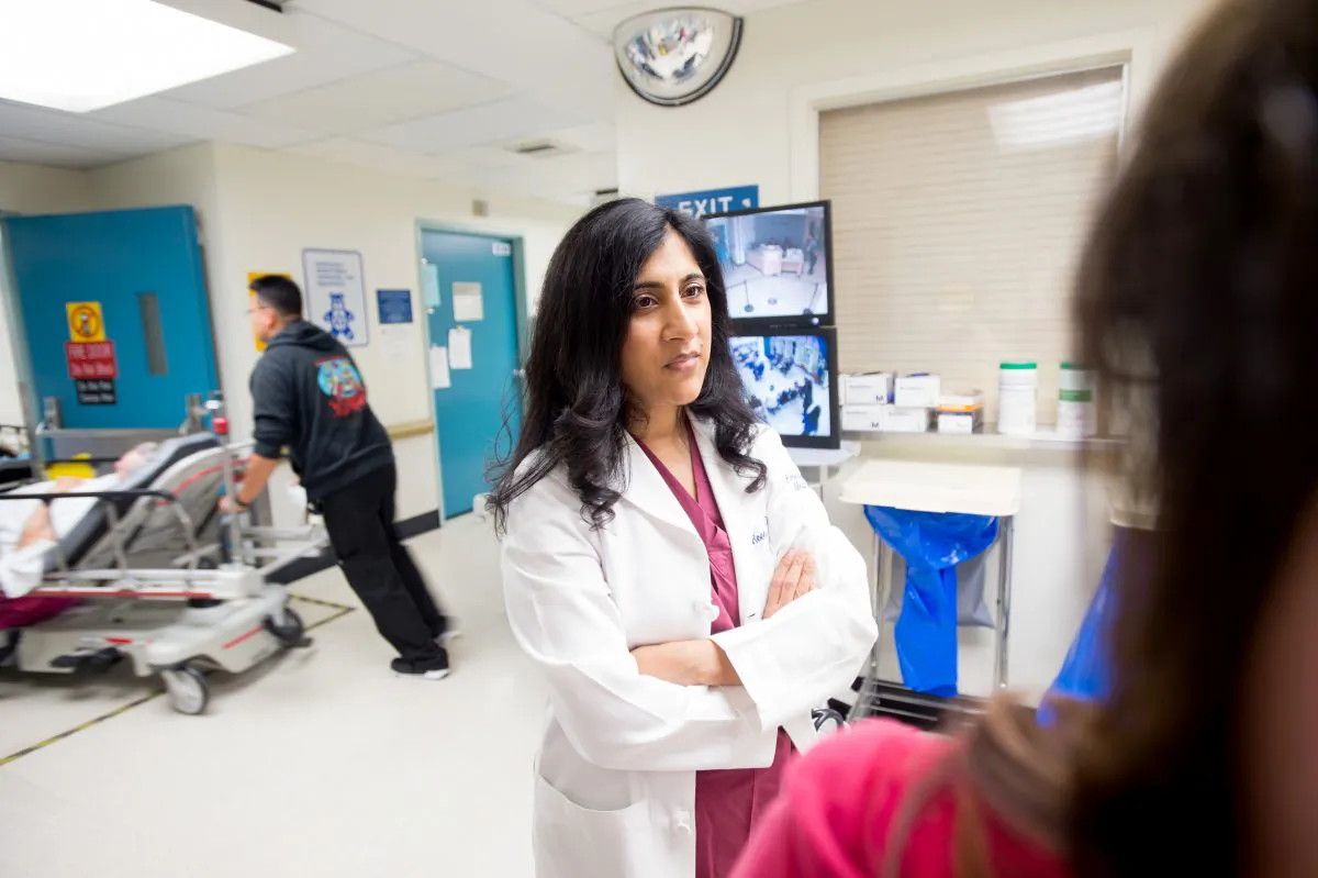 In this June 4, 2015 photo, Dr. Reena Duseja, lead author of a study on emergency room visits, stands in San Francisco General Hospital's emergency room in San Francisco. (AP Photo/Noah Berger)