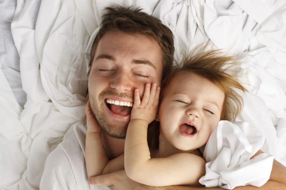 A father and daughter share a laugh. (Mark Carper/iStock)