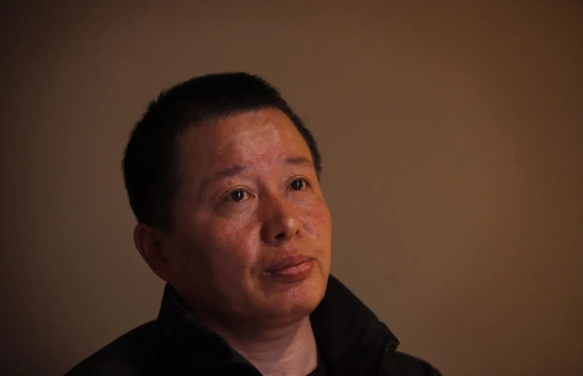 Gao Zhisheng, a human rights lawyer, meets the media after being detained by Chinese security agents for 13 months at a teahouse in Beijing, China, on April 7, 2010. (AP Photo/Gemunu Amarasinghe)