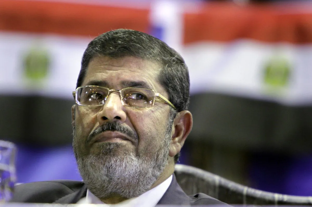 Mohammed Morsi, then the Muslim Brotherhood's presidential candidate, listens during a campaigning conference in Cairo, Egypt. On Tuesday, June 16, 2015 an Egyptian court confirmed a death sentence handed to ousted Islamist President Mohammed Morsi over a mass prison break during the 2011 uprising that eventually brought him to power. On Tuesday a separate ruling upheld a life sentence for Morsi and confirmed death sentences against 16 others over charges of conspiring with foreign groups, including the Palestinian militant group Hamas. (AP/Amr Nabil)