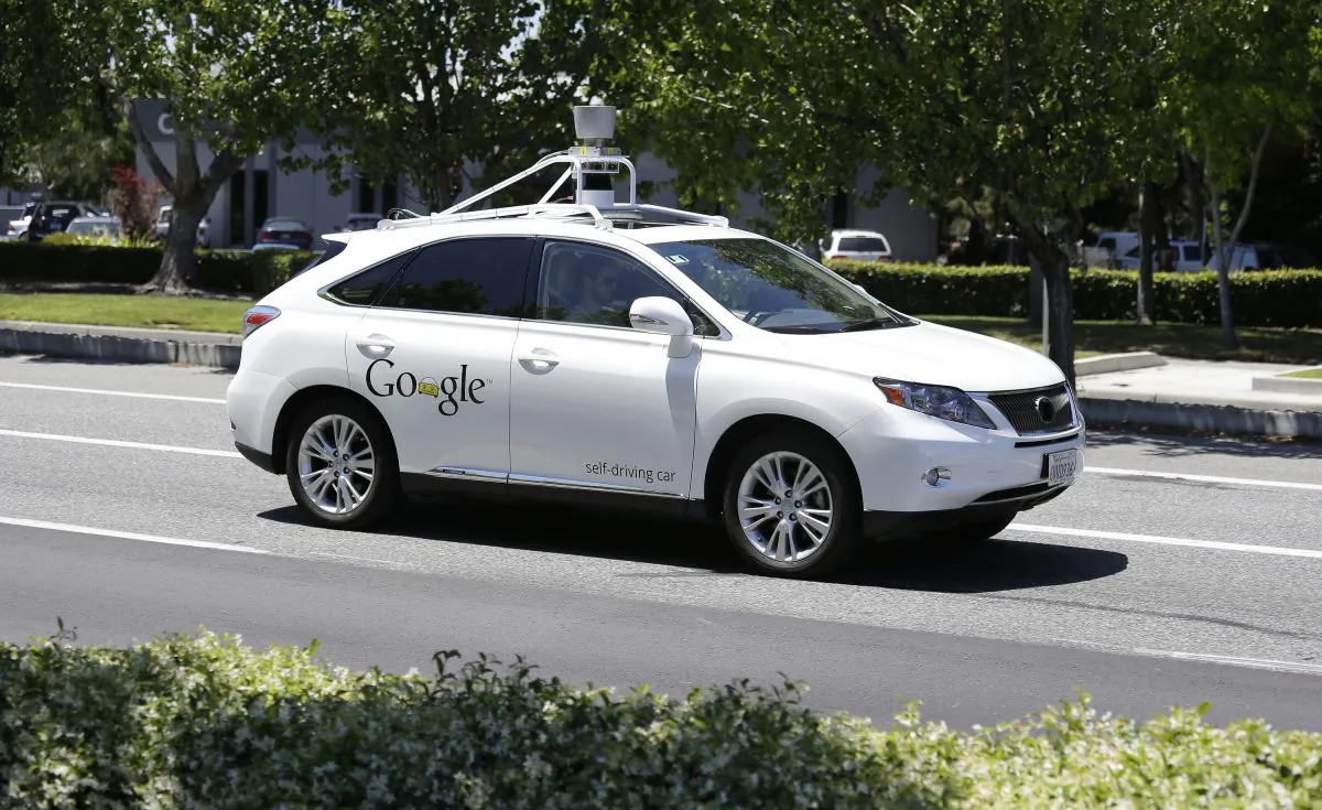 A Google self-driving car goes on a test drive near the Computer History Museum in Mountain View, California on May 13, 2014. (AP Photo/Eric Risberg, File)