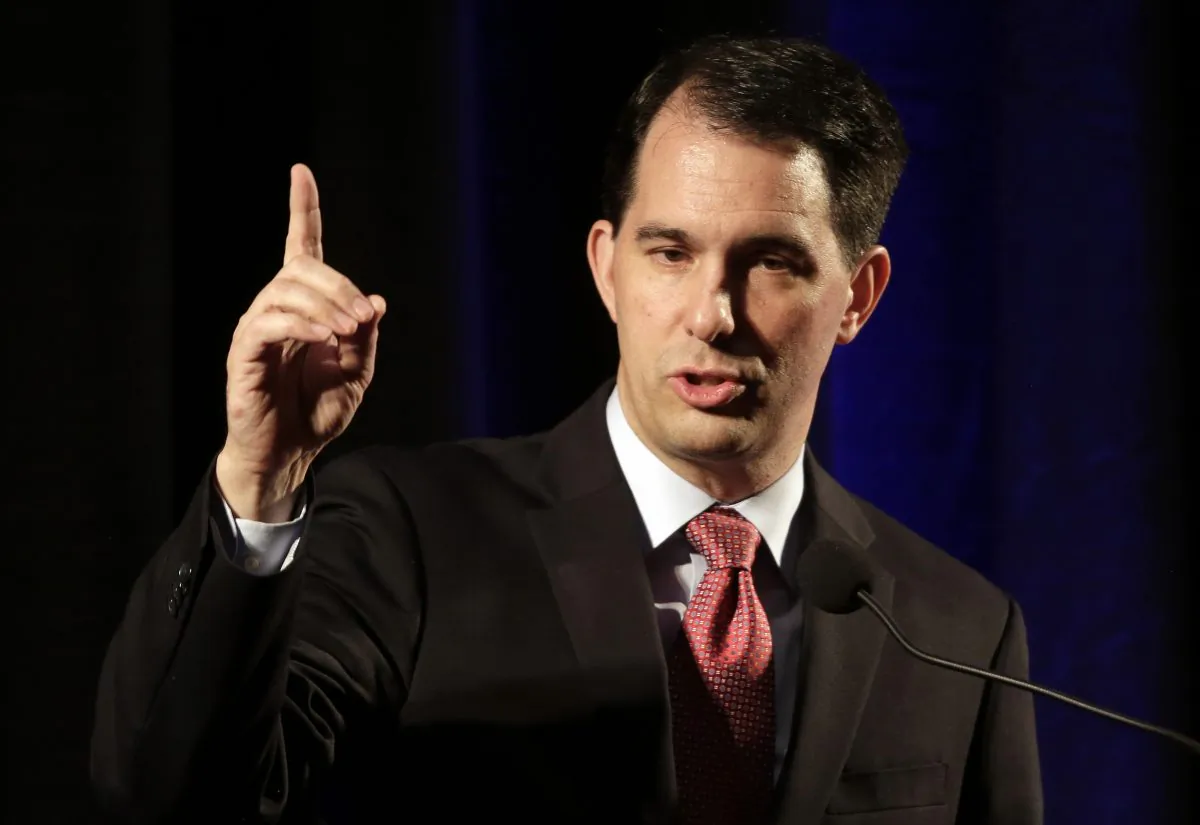 In this June 5, 2015 photo, Wisconsin Gov. Scott Walker speaks during the North Carolina Republican Party convention in Raleigh, N.C. (AP Photo/Gerry Broome)