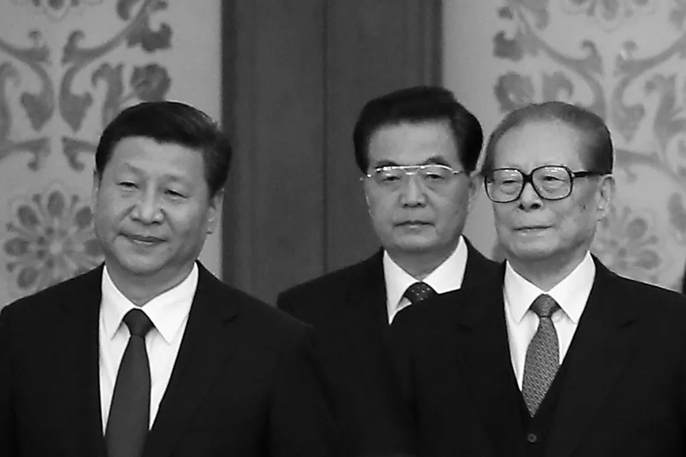 Chinese President Xi Jinping and his predecessors Hu Jintao and Jiang Zemin arrive for the National Day reception marking the 65th anniversary of the founding of the People's Republic of China at The Great Hall Of The People on September 30, 2014 in Beijing, China. (Feng Li/Getty Images)