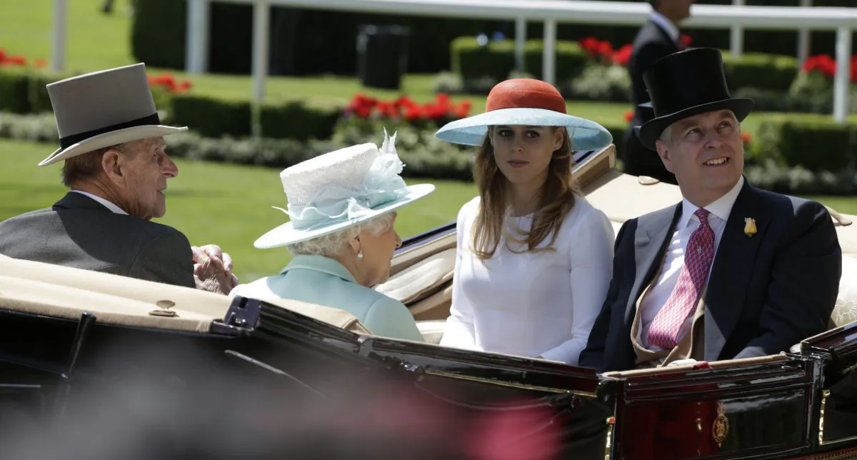 Princes Beatrice, 2nd right, with her father Prince Andrew, right, share the same carriage as Britain's Queen Elizabeth II and Prince Philip as they arrive in the parade ring on the third day of the Royal Ascot horse racing meet at Ascot, England, Thursday, June 18, 2015. (AP Photo/Alastair Grant)