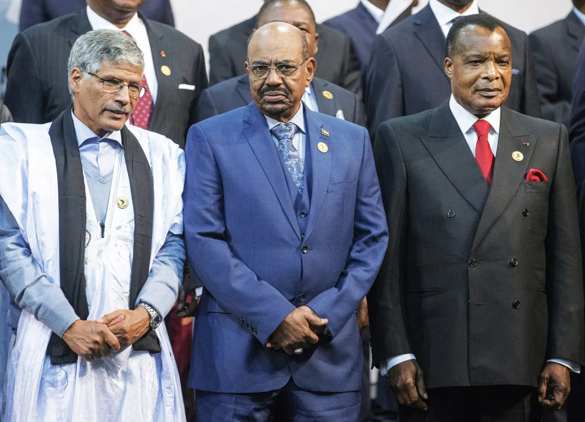 Sudanese President Omar al-Bashir (C), Congo's President Denis Sasso-Nguesso (R) and Prime Minister of the Sahrawi Arab Democratic Republic Abdelkader Taleb Oumar (L) at the 25th African Union Summit in Sandton, South Africa, on June 14. (Gianluigi Guercia/AFP/Getty Images)