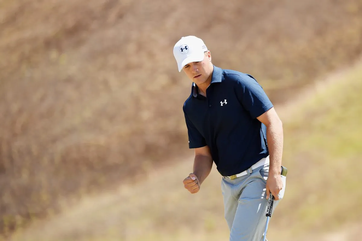 Jordan Spieth celebrates after a birdie putt on the ninth green during the second round of the 115th U.S. Open Championship at Chambers Bay on June 19, 2015 in University Place, Washington. (Harry How/Getty Images) 