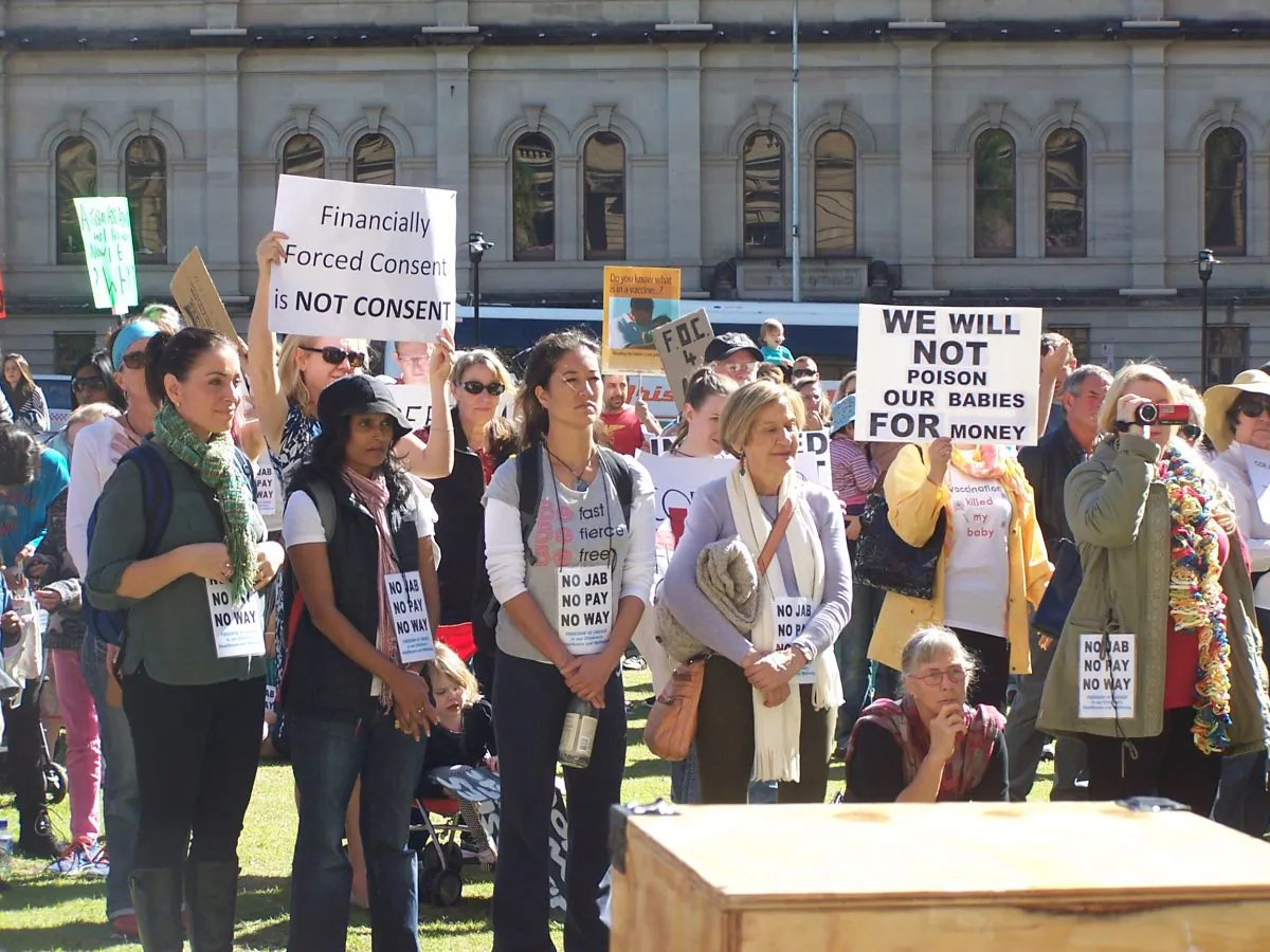 Supporters with banners at NO JAB, NO PAY, NO WAY rally at Queens Square, Brisbane on June 22, 2015. (Laurel Andress/Epoch Times)