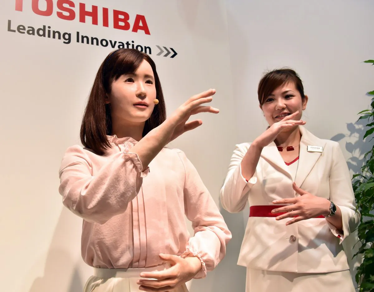 Japan's electronics giant Toshiba unveils the humanoid robot 'Aiko Chihira' which demonstrates sign language at the CEATEC electronics trade show in Chiba, suburban Tokyo on October 7, 2014. (Yoshikazu Tsuno/AFP/Getty Images)