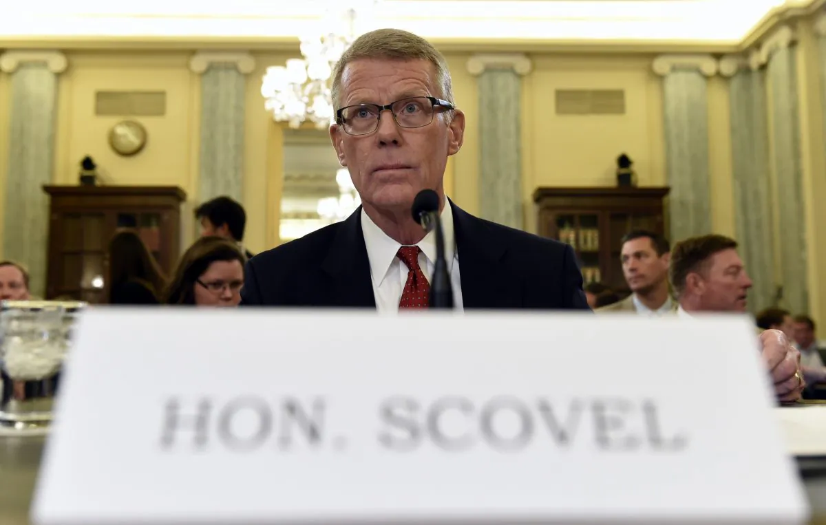 Department of Transportation Inspector General Calvin L. Scovel III, as waits to testify before the Senate Commerce, Science, and Transportation Committee on Capitol Hill in Washington, Tuesday, June 23, 2015, for a hearing on faulty Takata airbags. (AP Photo/Susan Walsh)