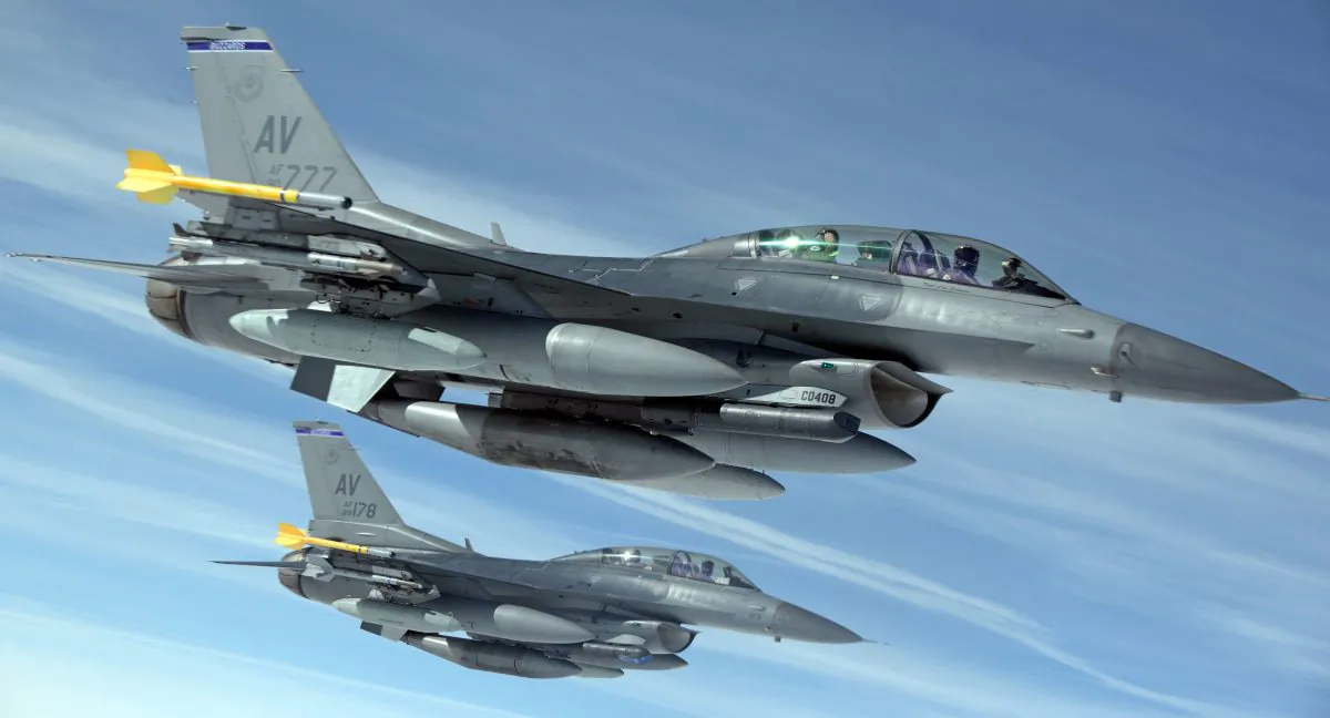 Two F-16 Fighting Falcons from the 31st Fighter Wing, Aviano Air Base, Italy, fly over Europe on March 20, 2015. (U.S. Air Force photo/Senior Airman Christine Griffiths)