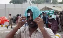 Rains Cool Pakistan as Heat Wave’s Death Toll Climbs Past 800