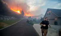 California Wildfire That Jumped Interstate 15 Calms Overnight