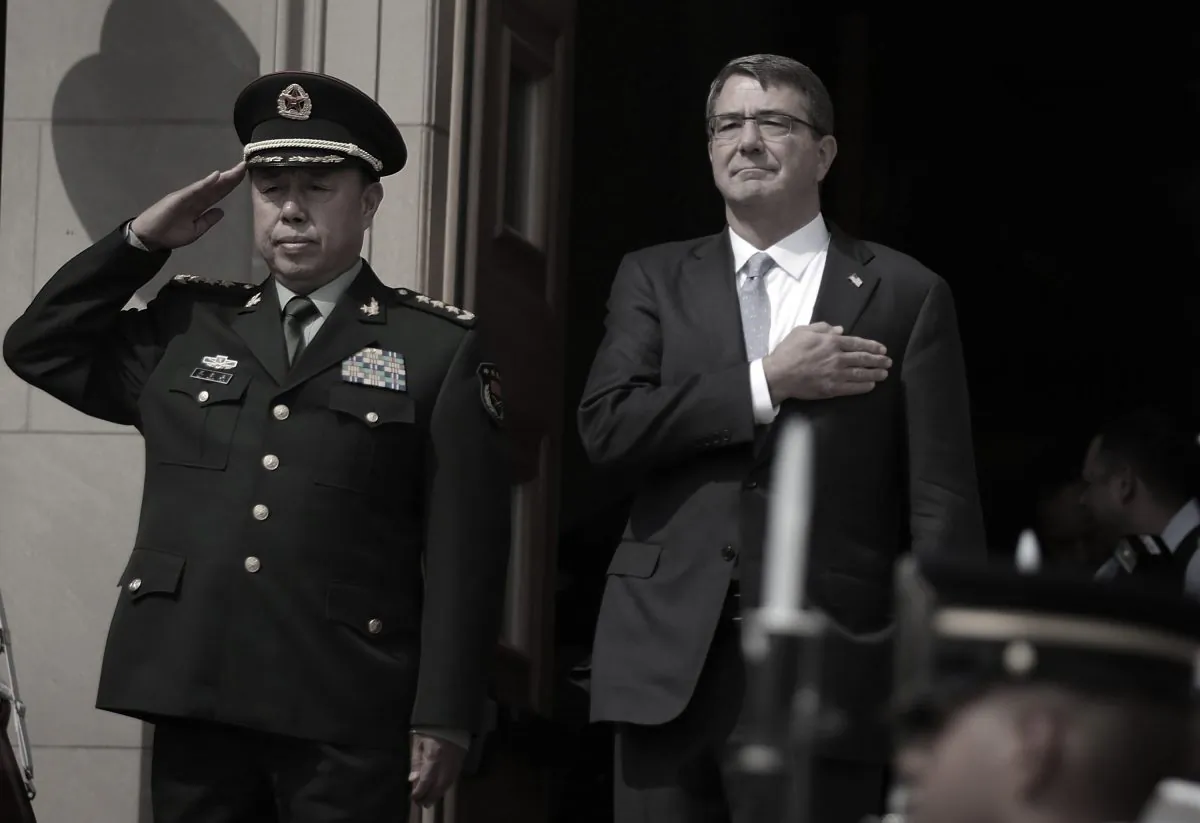  U.S. Secretary of Defense Ashton Carter (2nd L) and Gen. Fan Changlong (L), Vice Chairman of the Chinese Central Military Commission of People's Liberation Army, listen to the U.S. national anthem as they participate in an honor cordon June 11, 2015 at the Pentagon in Arlington, Virginia. (Alex Wong/Getty Images)