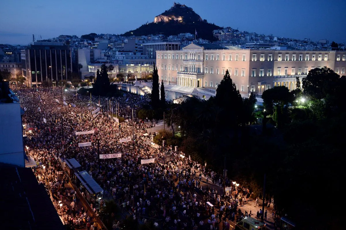 Carrying banners calling for a 'NO' vote in the forthcoming referendum on bailout conditions set by the country's creditors, protesters gather in front of the Greek parliament in Athens, on June 29, 2015. Some 17,000 people took to the streets of Athens and Thessalonique to say 'No' to the latest offer of a bailout deal Monday, accusing Greece's international creditors of blackmail. (Louisa Gouliamaki/AFP/Getty Images)