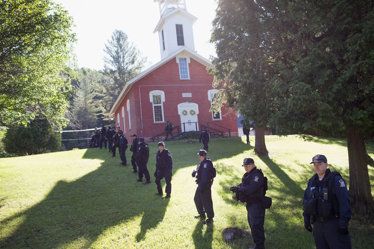 Law enforcement personnel prepare to head out on a search for convicted murderers Richard Matt and David Sweat continues on June 26, 2015 in Chasm Falls, New York. Matt and Sweat were discovered missing from a prison in nearby Dannemora on June 6. DNA from the two was reportedly found recently in a remote hunting cabin about 15 miles west of the prison. (Scott Olson/Getty Images)