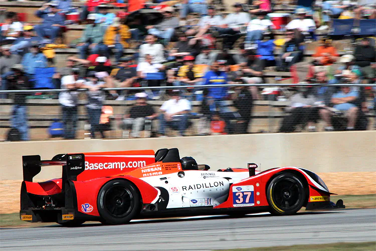 Conquest’s Morgan-Nissan roars past the crowd at Road Atlanta during the 2012 Petit Le Mans, where the car finished eight seconds behind the class winner after ten hours of racing. (James Fish/The Epoch Times)