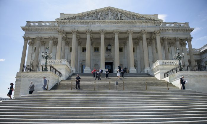 Members of Congress leave after a series of votes effecting the fast tracking of the Trans-Pacific Partnership on Capitol Hill, in Washington, D.C., on June 12, 2015. (Brendan Smialowski/AFP/Getty Images)
