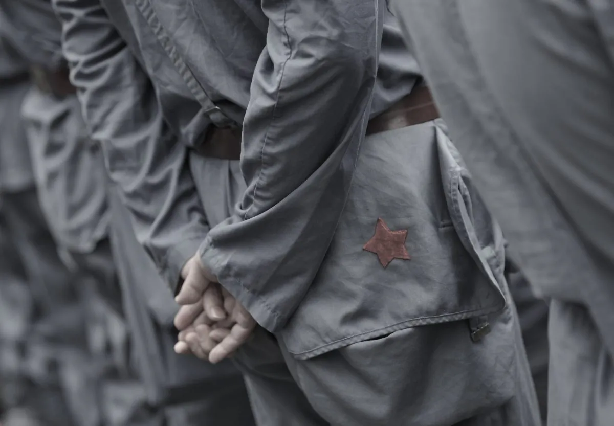 Tourists dressed in Red Army uniforms visit Mao Zedong’s former guerilla base in Jinggangshan, Central China, on Sept. 21, 2012. (Peter Parks/AFP/Getty Images)