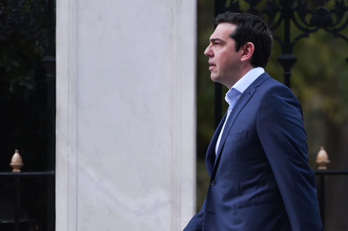 Greek Prime Minister Alexis Tsipras leaves the presidental palace after a swearing in ceremony of the new finance minister Euclid Tsakalotos on July 6, 2015. (Louisa Gouliamaki/AFP/Getty Images)