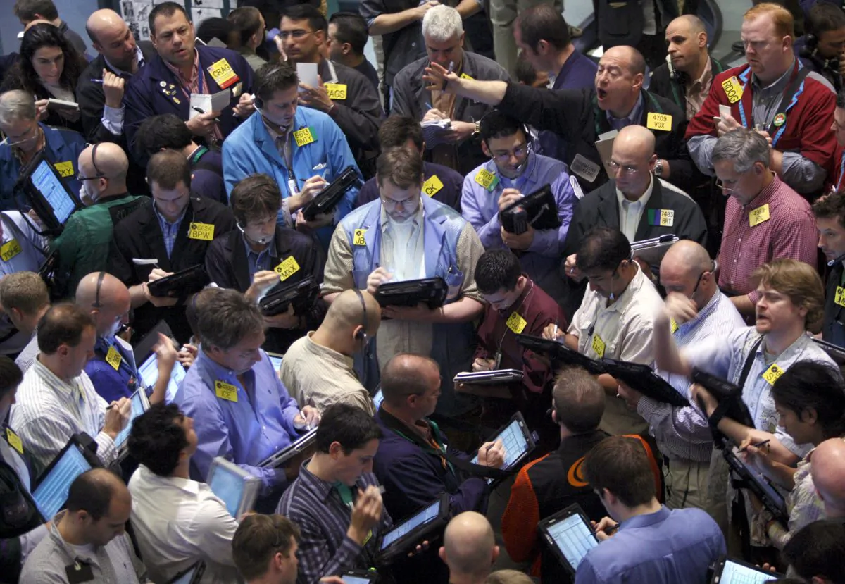 Traders deal crude oil options on the floor of the New York Mercantile Exchange. August 21, 2008. (AP Photo/Jin Lee)
