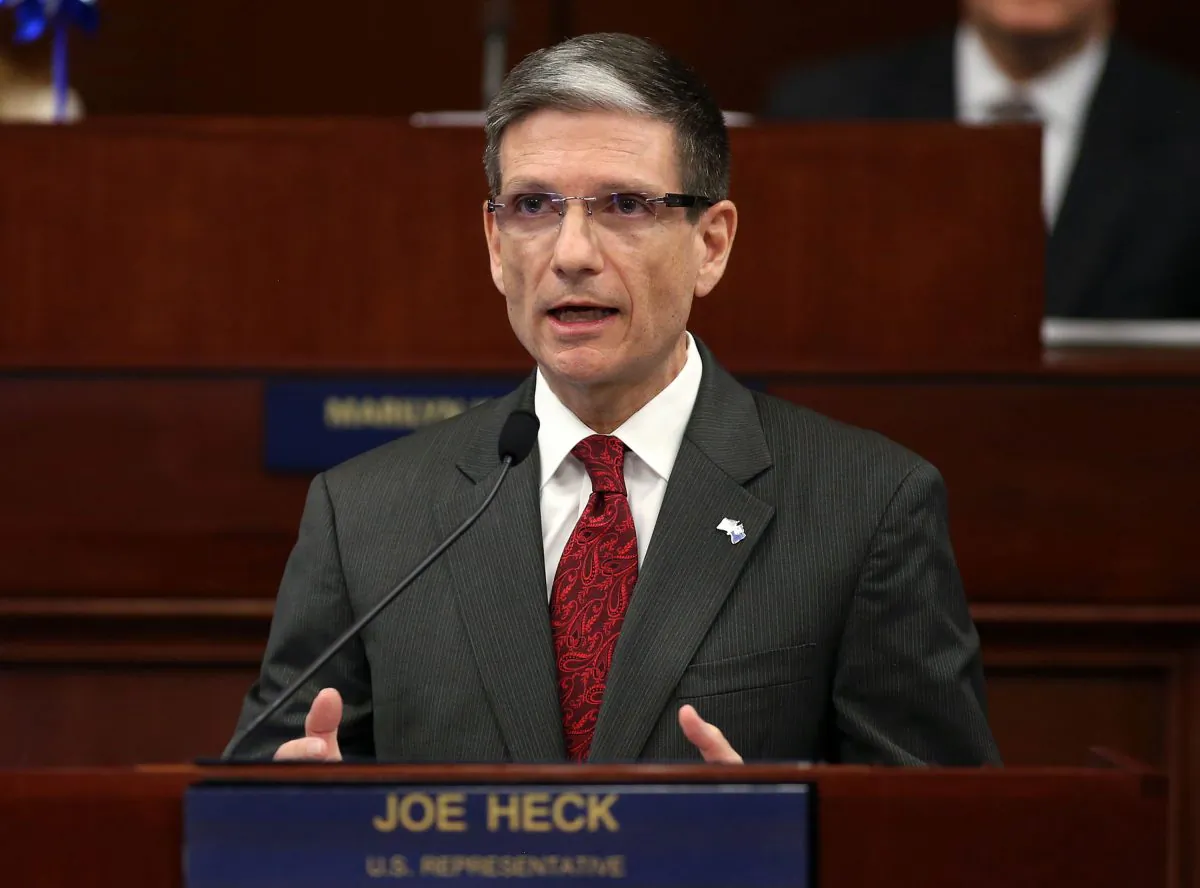 This April 3, 2013 file photo shows U.S. Rep. Joe Heck, R-Nevada, speaks to a joint session of the Legislature in Carson City, Nev. Heck on Monday, July 6, 2015 entered the race for the U.S. Senate seat being vacated by Nevada Democrat Harry Reid, setting in motion what could be one of the top Senate races of 2016. (AP Photo/Cathleen Allison)