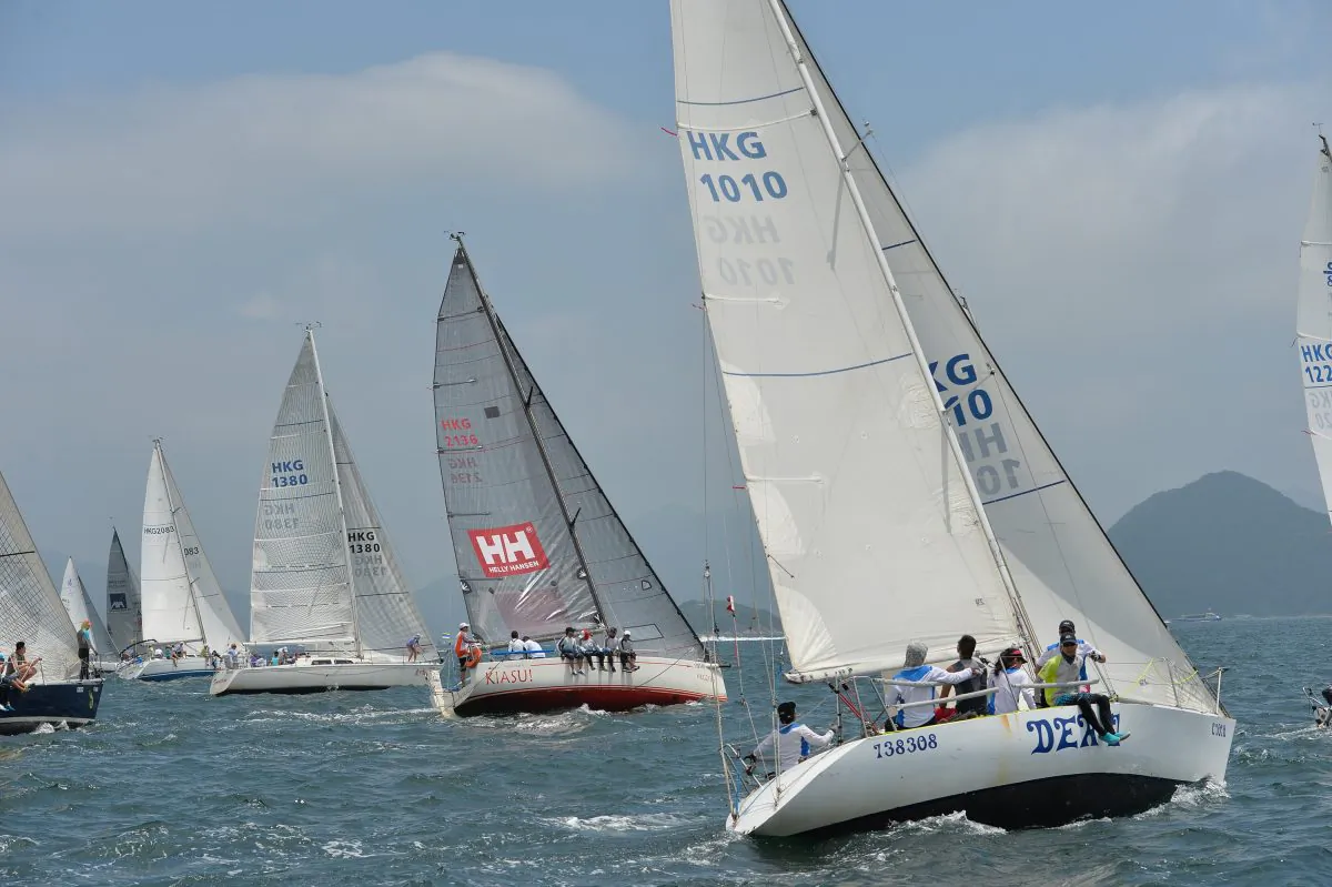 HKPN-A Division and J80 boats set off for an Islands Race at the start Race-4 of the Heb Haven Yacht Club Quest Yachting Typhoon Series 2015 at Port Shelter on Sunday July 5, 2015. (Bill Cox/Epoch Times)