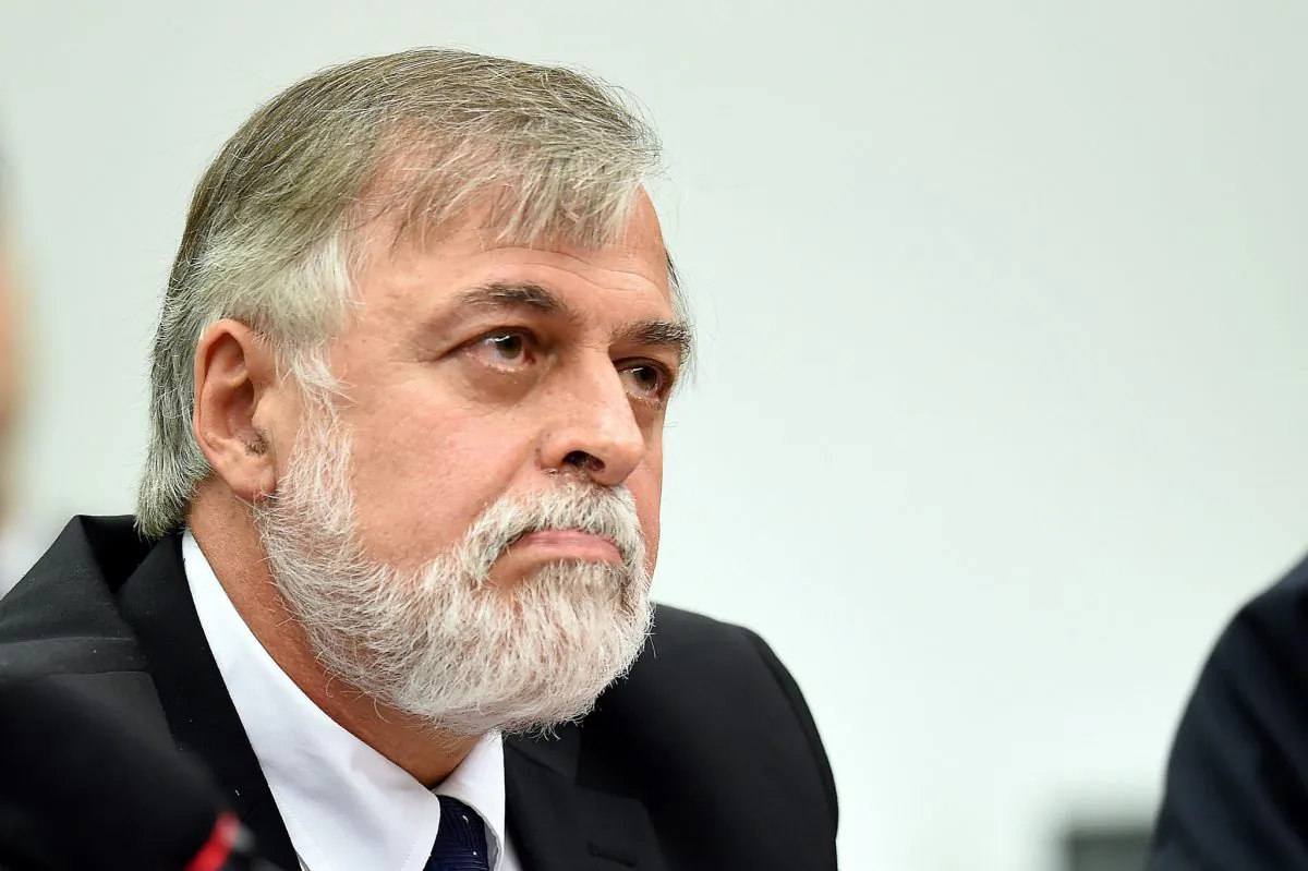 Former Petrobras Director of Supplies Paulo Roberto Costa speaks during a hearing with the Parliamentary Commission of Inquiry that is investigating accusations of corruption in Petrobras, in Brasília, on May 5, 2015. Dozens of politicians from five parties, including from that of Brazilian President Dilma Rousseff, have been implicated in a corrupt network which laundered billions of dollars through Brazil's state oil giant. (Evaristo Sa/AFP/Getty Images)