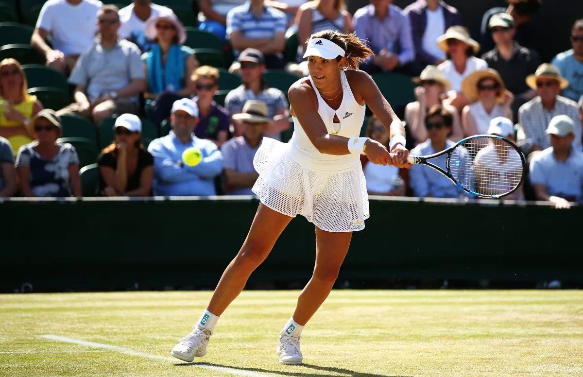 Garbine Muguruza of Spain returns a shot in her Ladies' Singles Fourth Round match against Caroline Wozniacki of Denmark during day seven of the Wimbledon Lawn Tennis Championships at the All England Lawn Tennis and Croquet Club on July 6, 2015 in London, England. (Ian Walton/Getty Images)