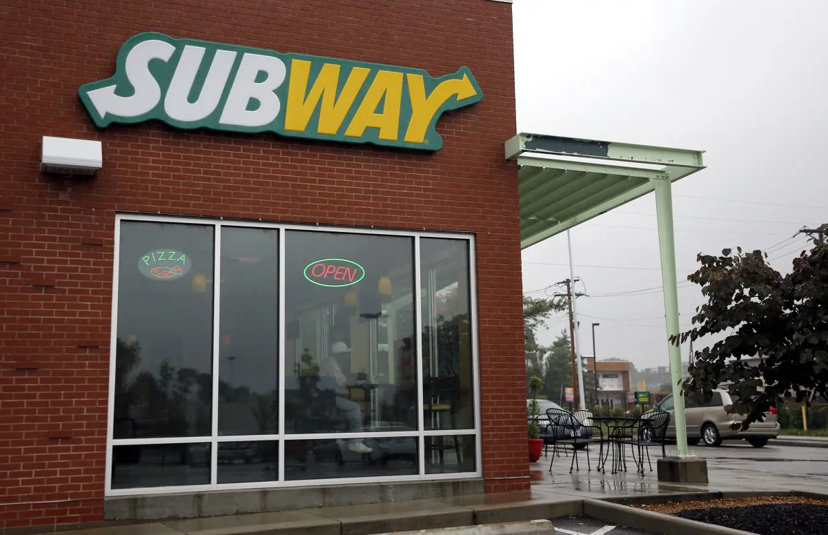 A Subway restaurant is shown Tuesday, July 7, 2015, in St. Louis. FBI agents and Indiana State Police raided the home of Subway restaurant spokesman Jared Fogle on Tuesday, removing electronics from the property and searching the house with a police dog. (AP Photo/Jeff Roberson)