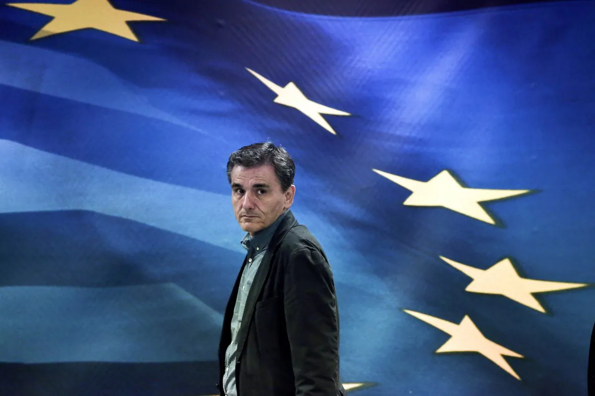 Newly appointed Greek Finance Minister Euclid Tsakalotos arrives for a handover ceremony at the Finance Ministry in Athens on July 6, 2015. (Angelos Tzortzinis/AFP/Getty Images)