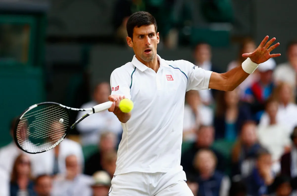  Novak Djokovic of Serbia plays a forehand in his Gentlemens Singles Quarter Final match against Marin Cilic of Croatia during day nine of the Wimbledon Lawn Tennis Championships at the All England Lawn Tennis and Croquet Club on July 8, 2015 in London, England. (Julian Finney/Getty Images)