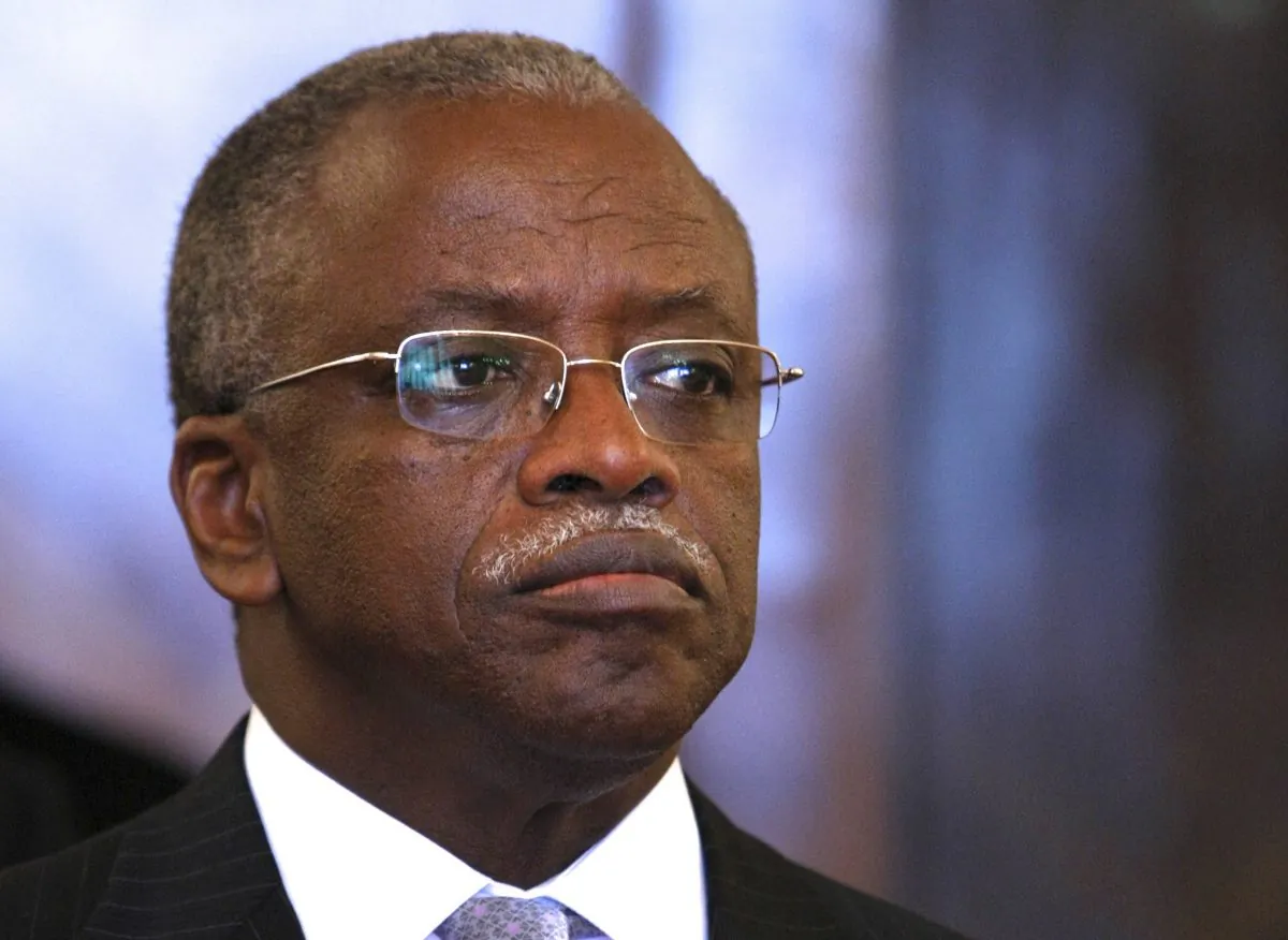In this Thursday, March 31, 2011 file photo, Uganda's then Security Minister Amama Mbabazi meets with Russia's counterpart Sergey Lavrov in Moscow. Ugandan police said Thursday, July 9, 2015 that they have detained former Prime Minister Amama Mbabazi, who last month announced he would seek the presidency in elections next year, as he traveled from the Ugandan capital Kampala to a town in eastern Uganda where he wanted to consult with his supporters. (AP Photo/Alexander Zemlianichenko)