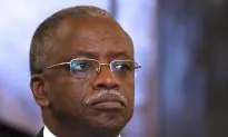 Uganda Police Detain a Former Prime Minister