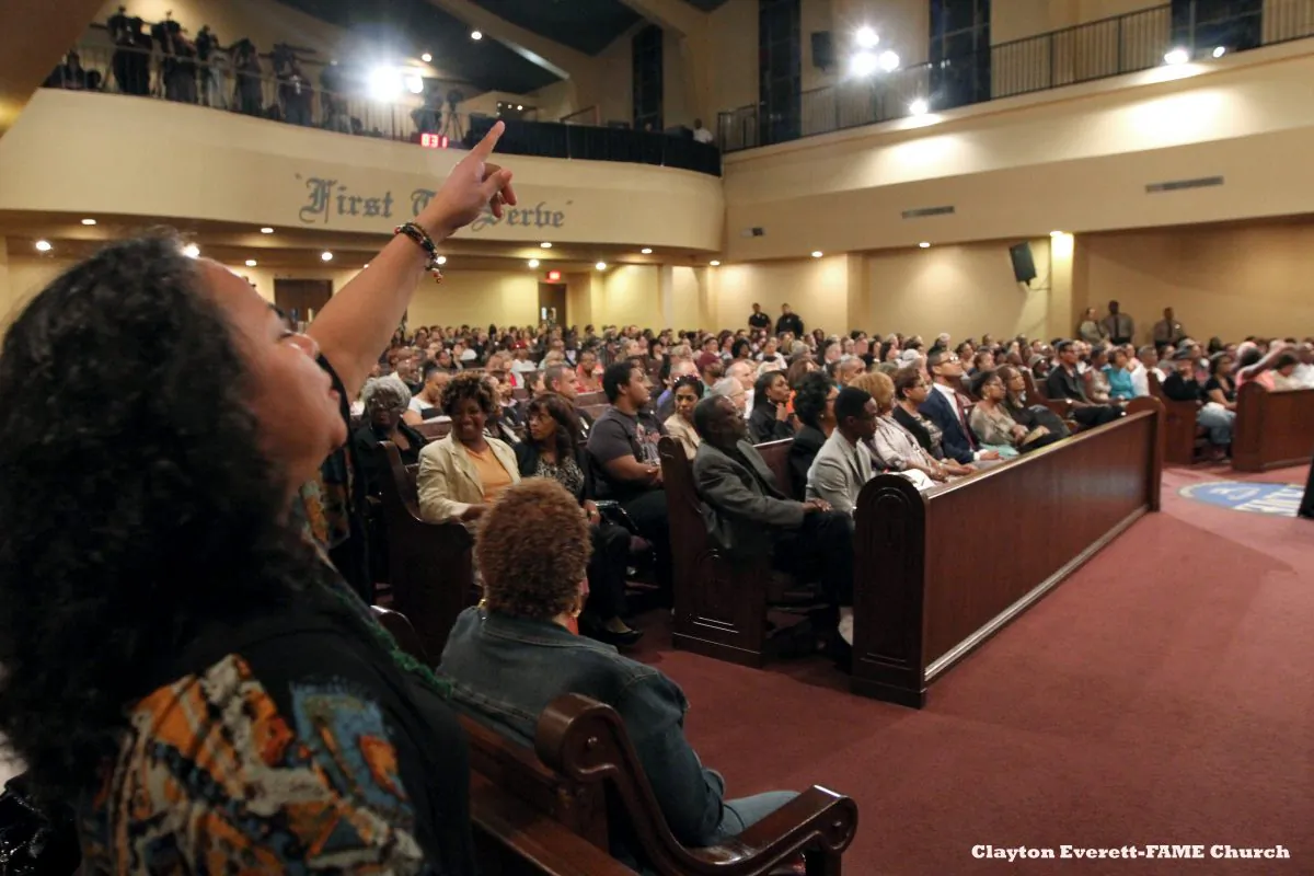 Call and response at the congregation at First AME Church in Los Angeles, June 18. The gathering was to honor the lives lost in Charleston, S.C., on June 17. (Clayton Everett)