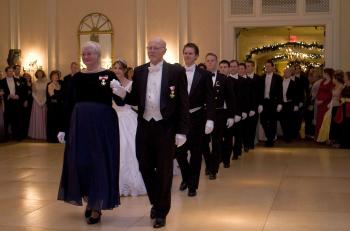 Dance Masters Herb and Carol Traxler lead the cotillion into the ball room. (Lisa Fan/The Epoch Times)