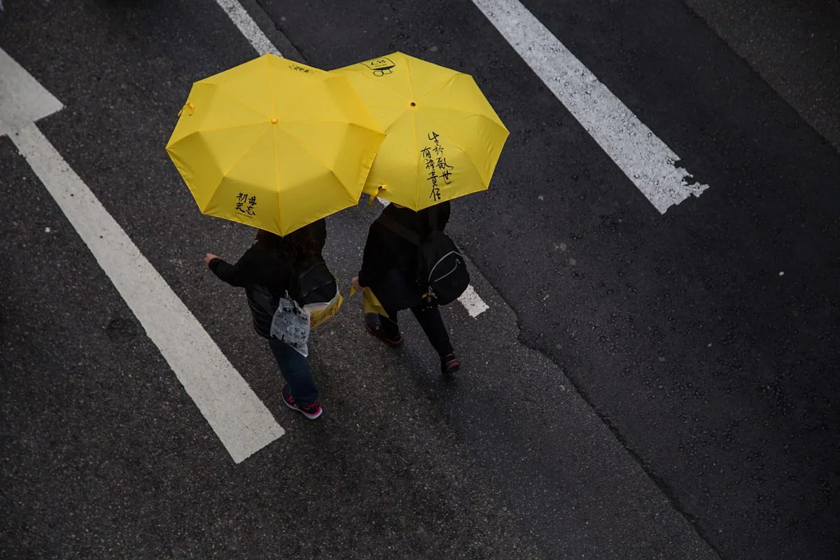 Pro-democracy protesters hold yellow umbrellas during a march for democracy on Feb. 1, 2015 in Hong Kong. (Lam Yik Fei/Getty Images)