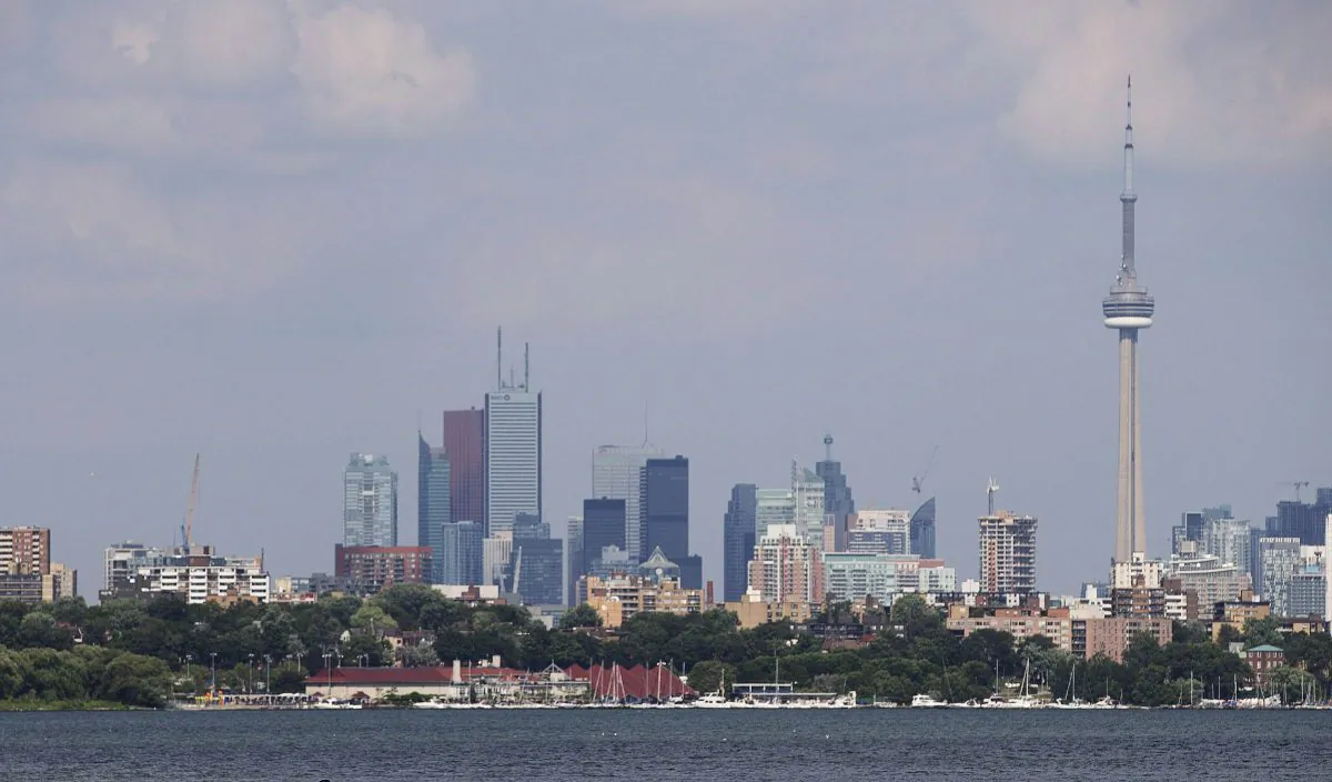 The Toronto skyline on July 17, 2013. Pauline Lierman, director of market research at Urbanation, says the supply of condos has dropped this year in the downtown core, with currently just a 5- to 6-month supply. (The Canadian Press/Michelle Siu)