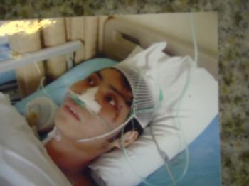 Ji's son, Li Shuangshang, was stabbed 13 times by a thug in the course of their house being demolished. (Photo provided by family) Ji's son, Li Shuangshang, was stabbed 13 times by a thug in the course of their house being demolished. (Photo provided by family)