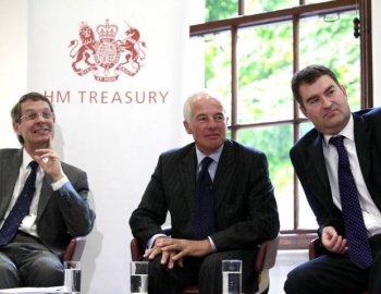 John Whiting (L), of the Chartered Institute of Taxation, Michael Jack (C), former UK treasury minister and David Gauke (R) UK exchequer secretary to the treasury, at HM Treasury July 20, in London, England. A tax blunder by HM Revenue will affect over 5.5 million, 1.4 million adversely.