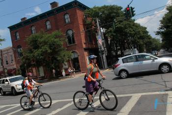 People ride bicycles downtown in central Rhinebeck, New York. (Chris Hondros/Getty Images)