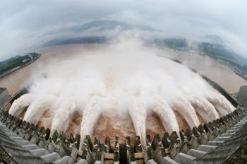 A picture shows this year's biggest release of water from the sluice for flood prevention at the Three Gorges Dam in Yichang, central China's Hubei province, on July 20, after relentless torrential rains hit Yangtze River areas. (AFP/AFP/Getty Images)