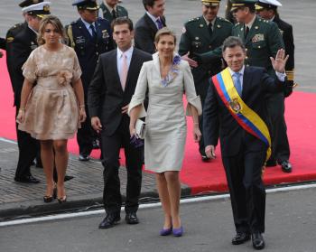 Newly sworn-in Colombian President Juan Manuel Santos (R) waves next to his wife Maria Clemencia Rodriguez(2R) and his son Martin(3R) and Maria Antonia in Bogota on August 7, 2010.  (Rodrigo Arangua/AFP/Getty Images)