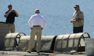 WWII Plane Lifted From the Depths of California Reservoir